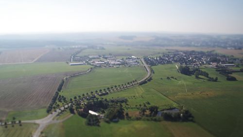 Aerial view of agricultural field against sky