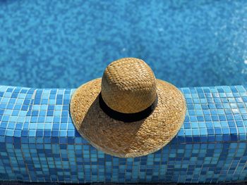 High angle view of hat on swimming pool