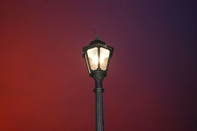 Close-up of illuminated light bulb