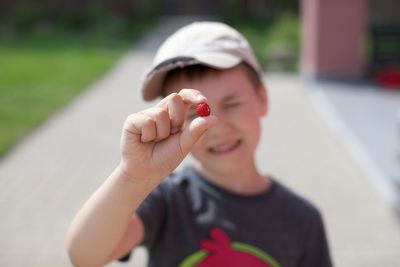 Portrait of boy holding ice cream