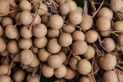 Full frame shot of longans for sale at market