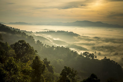 Scenic view of mountains against sky during sunset