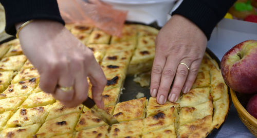 Close-up of man preparing food