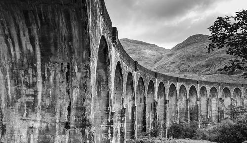 Low angle view of old bridge