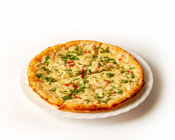 High angle view of pizza in plate against white background