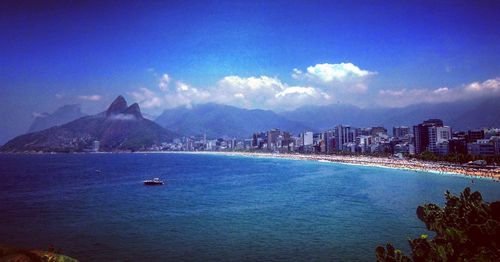 View of sea with buildings in background