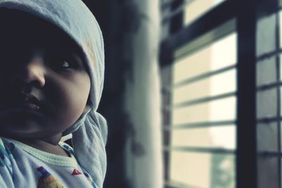 Portrait of cute girl looking away