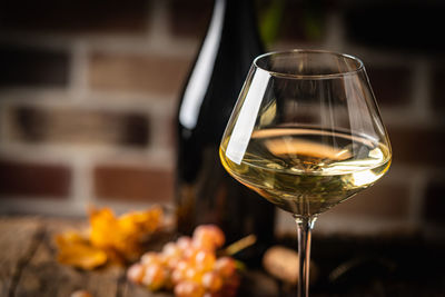 Close-up of wineglass on table