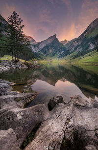 Scenic view of lake against sky during sunset