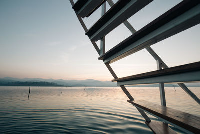 Wooden ladder at lake