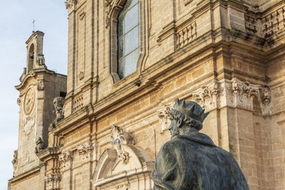 Low angle view of statue of historic building