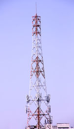 Low angle view of communications tower against sky