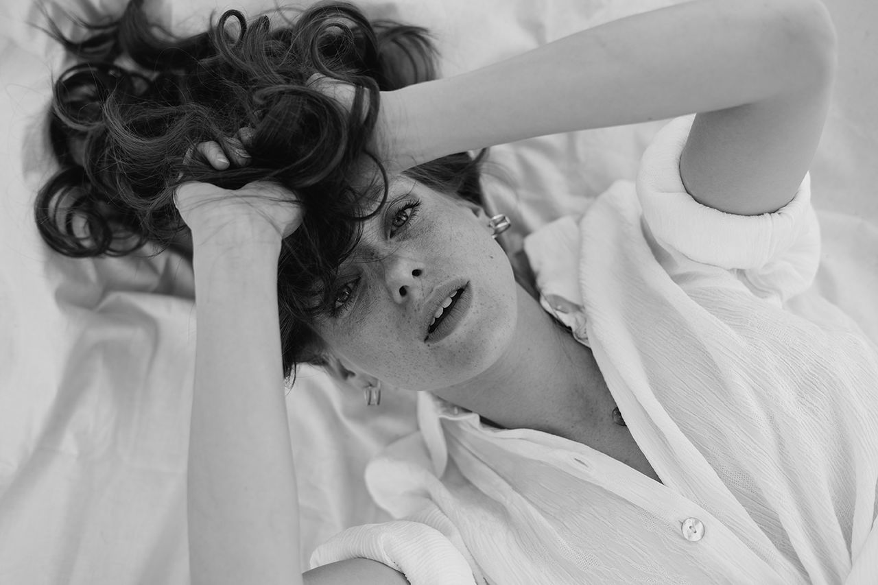 white, black and white, women, adult, monochrome photography, indoors, bride, bed, person, lying down, monochrome, one person, female, portrait, young adult, photo shoot, clothing, bedroom, furniture, lifestyles, hairstyle, human face, dress, relaxation, fashion, emotion, high angle view, wedding dress, domestic room