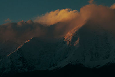 Scenic view of mountains against sky during sunset