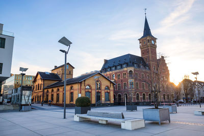 Buildings in city against sky