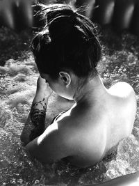 High angle portrait of woman in swimming pool