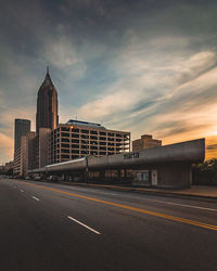 View of buildings against cloudy sky