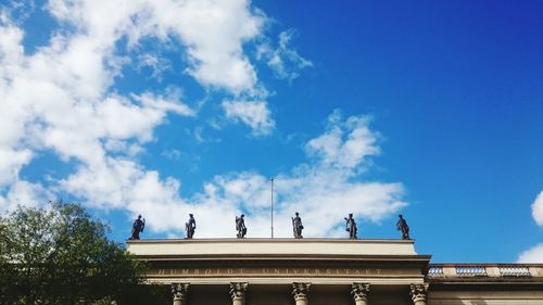 Low angle view of built structure against blue sky