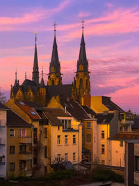 View of buildings against sky during sunset