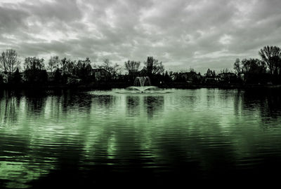 View of lake against cloudy sky