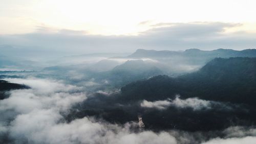 Aerial view of cloudscape over mountains