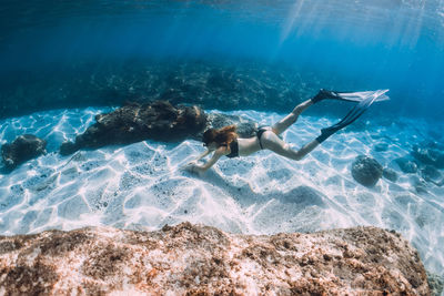 Man swimming in sea