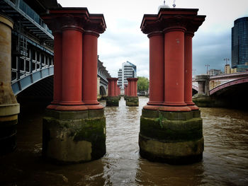 View of water fountain in front of built structures