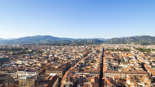 High angle shot of townscape against clear sky