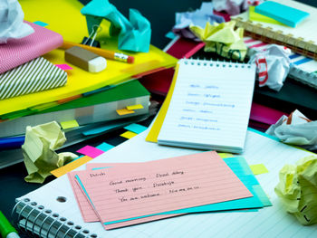 Close-up of multi colored book on table