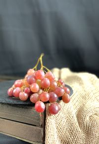 Close-up of grapes on table