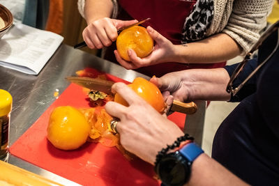 High angle view of people preparing food