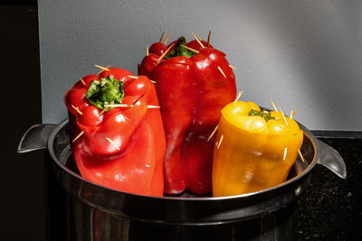 Close-up of red chili peppers on table