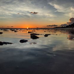 Scenic view of sea against sky during sunset