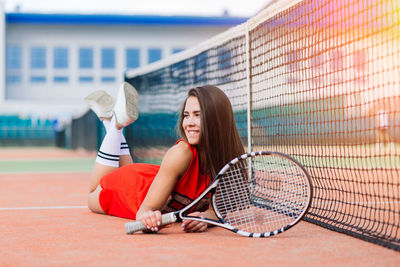 Young woman playing tennis