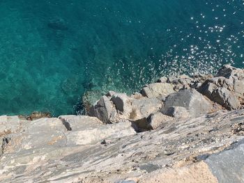 High angle view of rocks on beach