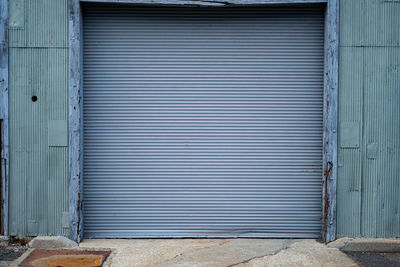 Closed shutter of old building