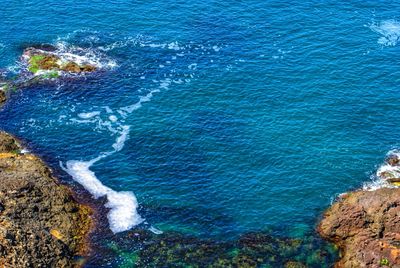 High angle view of rocky beach