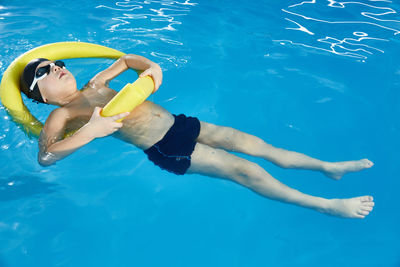 Woman swimming in sea