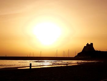 View of calm sea at sunset