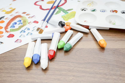 High angle view of paintbrushes on table