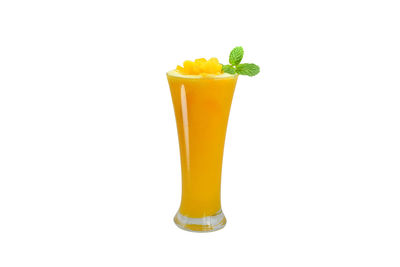 Close-up of drink against white background