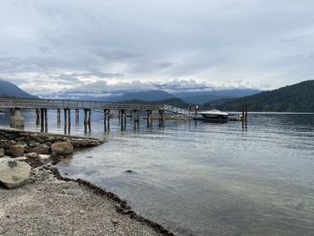 Pier over sea against sky