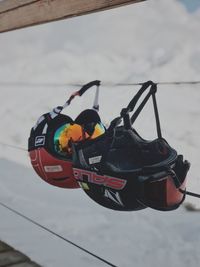 Close-up of sunglasses against sky