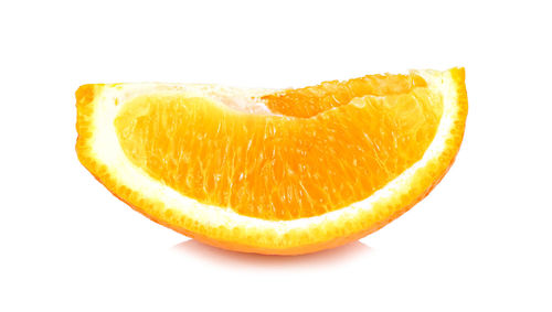 Close-up of orange slice against white background