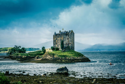 Scenic view of scottish castle against sky