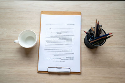 High angle view of coffee cup on table