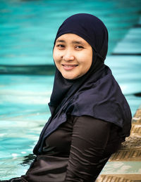 Portrait of young woman in boat