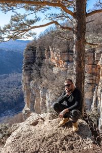 Young man on rock