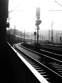 Train on railroad track against sky