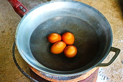 High angle view of fruits in container